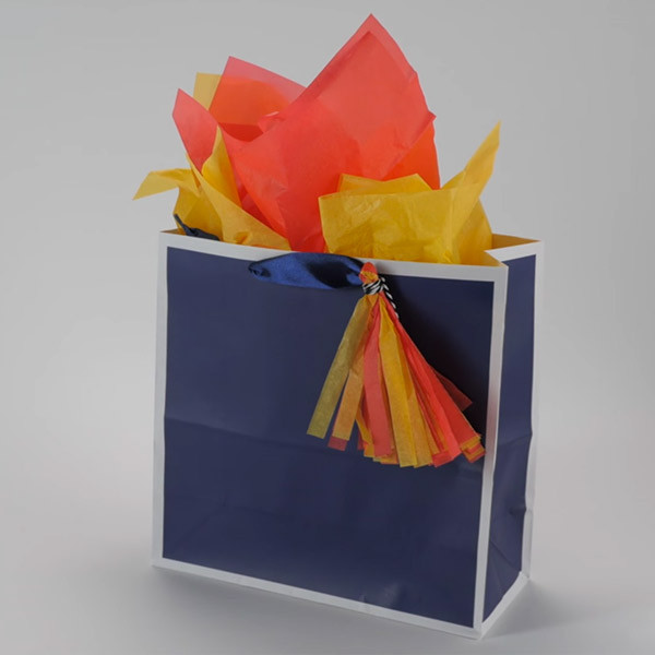 Giftology: how to put tissue paper in a gift bag